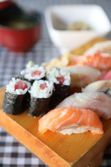 Sushi Set nigiri and sushi maki with tea served on wood and soup , Japanese food