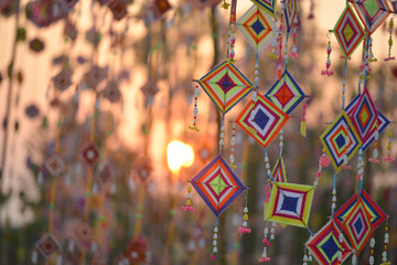 Colorful mini square cloth flag curtain with sunrise in background