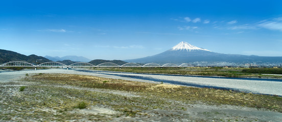 Distant View of Mount Fuji from bullet train, Japan