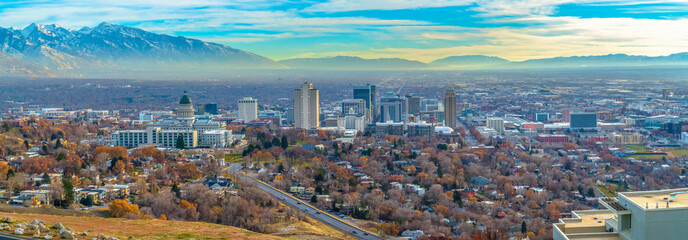 Utah State Capital Building and skyscrapers towering over the populous city
