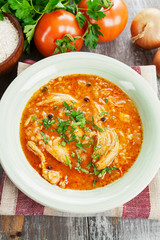 Traditional georgian soup kharcho in a plate on the table