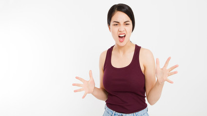 Angry Asian woman shouting to the front with mouth wide open on isolated white background