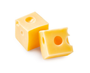 Two cheese cubes isolated on white background.