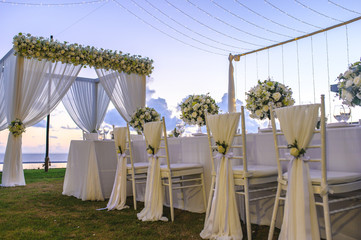 Table setting at a luxury wedding and Beautiful flowers on the table.