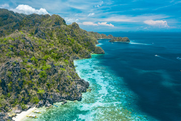 Fototapeta na wymiar Aerial view of beautiful lagoons and limestone cliffs of Coron, Palawan, Philippines