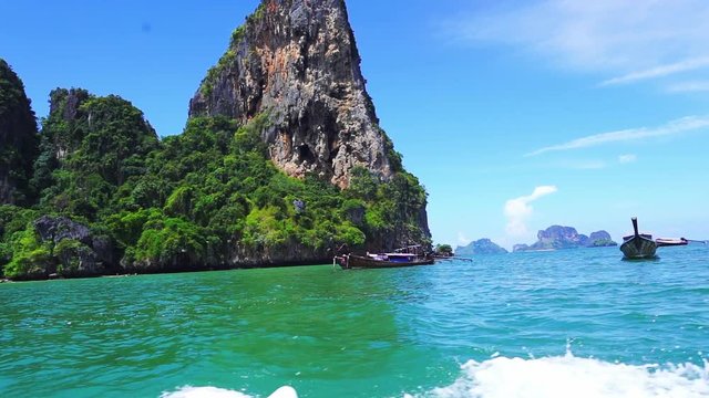Take a long tail boat to Railay Beach