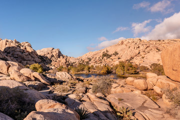 Lake inside rocks formation in Joshua Tree National Park. California state, USA.