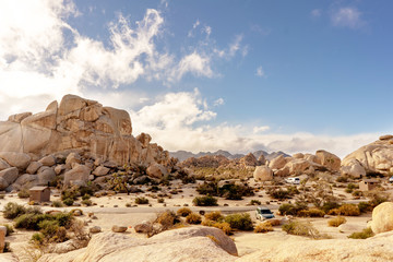 Camp site at Joshua Tree National park with outstanding rock formations and sand dunes around....
