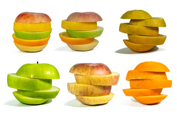 Fototapeta na wymiar Sliced fruit, stacked isolated add paths on a white background