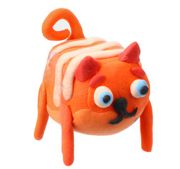 plasticine cat isolated on white background. modelling clay