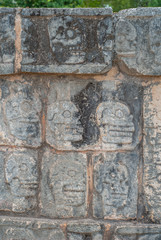 Details of skull engravings, on a Mayan temple, in the archaeological area of Chichen Itza, on the Yucatan peninsula