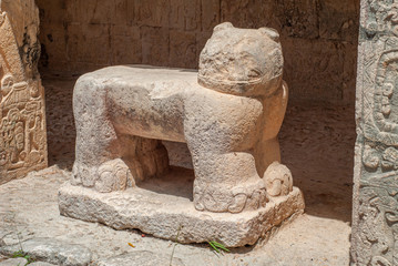 Sculpture of a quadruped animal, in the archaeological area of Chichen Itza, on the Yucatan...