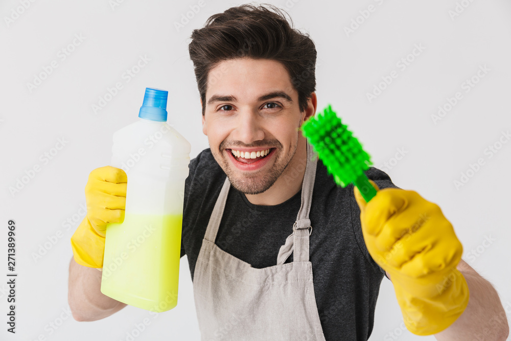 Sticker Handsome brunette houseman wearing apron