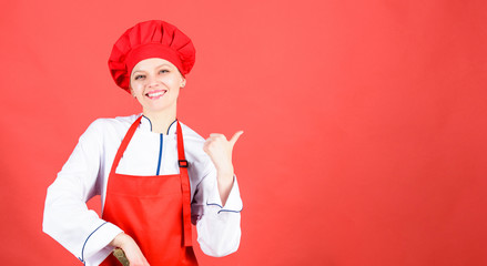 woman in cook hat and apron. professional chef in kitchen. Cuisine. happy woman cooking healthy food by recipe. Housewife with cooking knife. copy space. My favourite breakfast