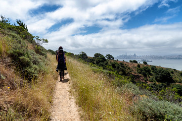 Fototapeta na wymiar Hikers on trail to Mt. Livermore on Angel Island in San Francisco Bay
