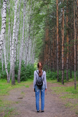 Fototapeta premium A woman in the woods.