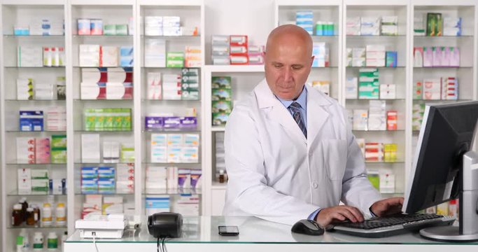 Pharmacist Talk to Cell Phone and Check Medicine Stock in Computer Database
