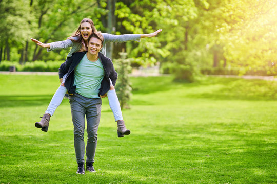 Young couple strolling in the park