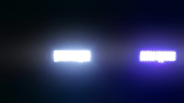 Police Siren Lights Flashing. This stock video presents a close-up shot of police siren lights flashing in the dark.It is a great supplemental footage for movies, TV shows, documentaries, news clips