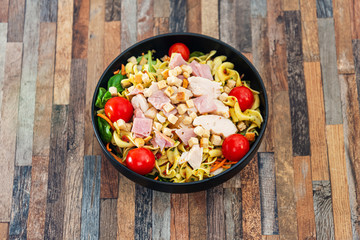 cereal specialties cooked with salad, roasted chicken aiguillette cured with salted and bacon
