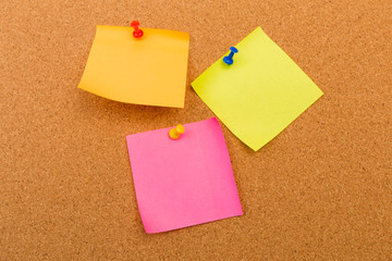 Cork board with pinned colored blank notes - Image .