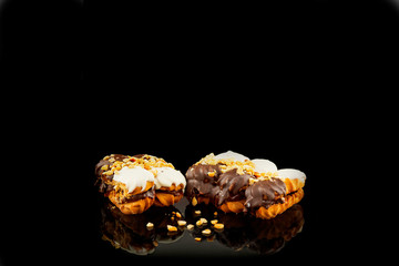 Assortment of fine chocolate candies, white, dark and milk chocolate Sweets black background. Space for text