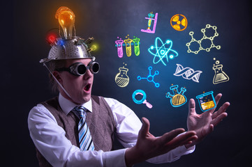 Funny scientist looking to chemistry symbols chemical