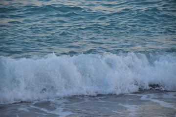 Sea waves splashing on beach water summer holiday