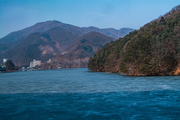 South Korea, 3 November 2014: The river turns into ice around Is a beautiful mountain