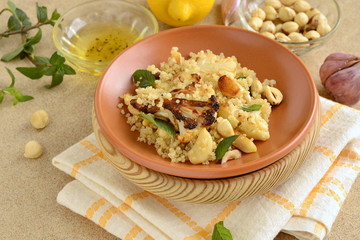 Baked cauliflower, quinoa and hazelnut salad