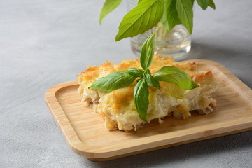 Cannelloni pasta stuffed with spinach, mushrooms,ricotta and sauce bechamel. Italian cuisine. Traditional food for Shavuot Jewish holiday