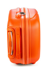 Travel orange suitcase isolated on white background. Close-up.