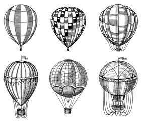 Obraz premium Set of Hot Air Balloons. Vector retro flying airships with decorative elements. Template transport for Romantic logo. Hand drawn Engraved vintage sketch.