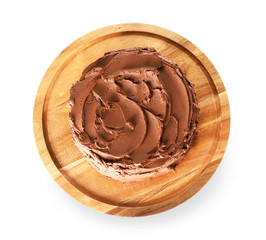 Stand with tasty chocolate cake on white background