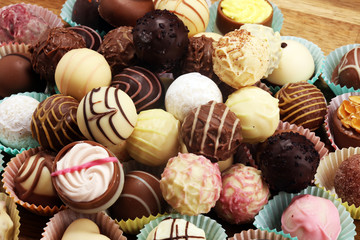 a lot of variety chocolate pralines, belgian confectionery gourmet chocolate praline.