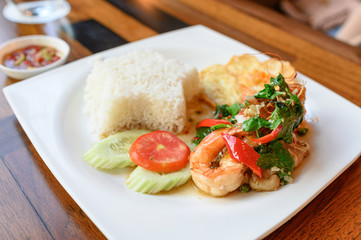 Stir-fried basil, chili with shrimp, squid with fried egg and white rice