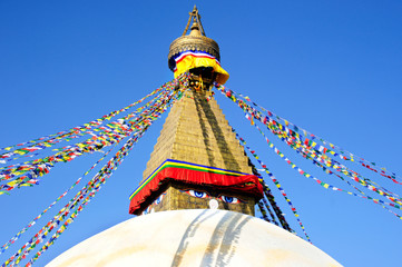 Prayer flags flying on the Boudhanath Stupa. symbol of Kathmandu, Nepal.