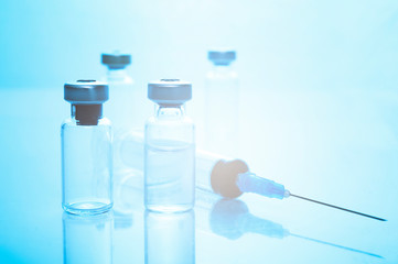 Medical concept Vaccination vaccine vial dose flu shot drug needle syringe