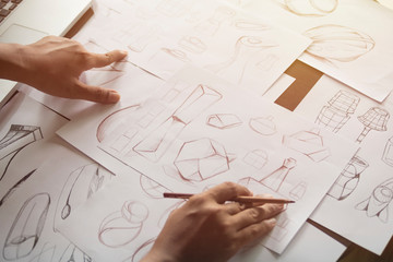 Production designer sketching Drawing Development Design product packaging prototype idea Creative...