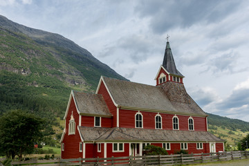 Fototapeta na wymiar Olden Church, a Red Church in Olden, Norway
