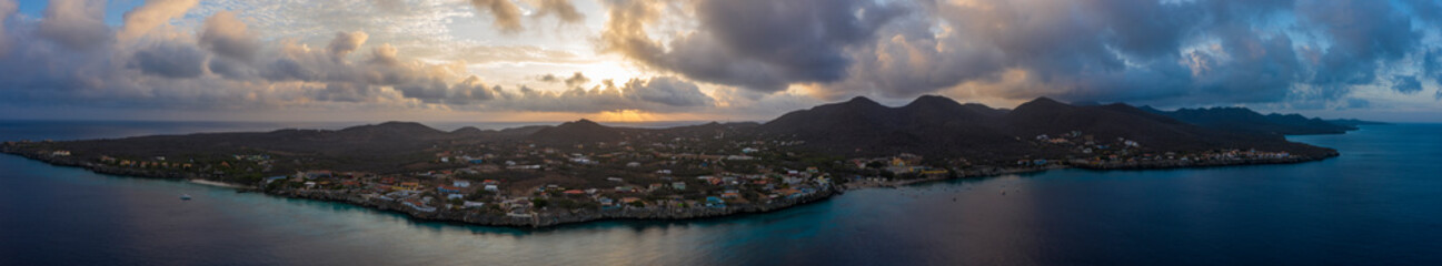 Fototapeta na wymiar Aerial view at sunrise over Playa Kalki, Playa Grandi and Playa Forti, located in Westpunt at the western side of Curaçao / Caribbean / Dutch Antilles