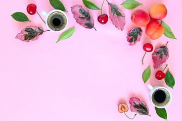 Coffee with fruits and follies on pink background. Top view with copy space. Flet lay style. Summer concept. © Ale02