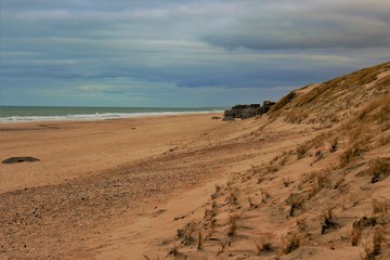 on the west coast in denmark with bunkers on the beach