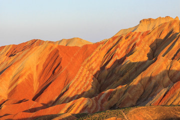 Fototapeta na wymiar Uniquely colored mountains of Zhangye during sunset
