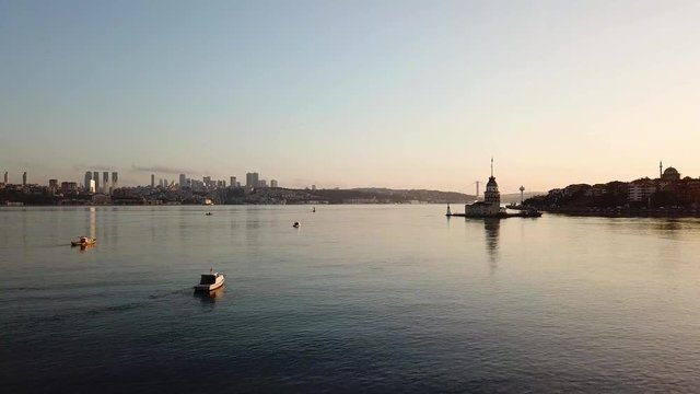 View from Bosporus, to Maiden tower, dawn, small fishing boats around, sm01