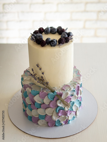 Two Tier Cream Cake In Blue Gray Lilac Colors Decorated With