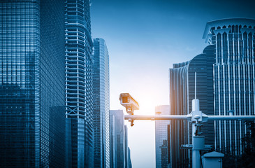 Monitors and skyscrapers in the city center