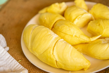 Beautiful yellow durian, ready to eat in the hands of consumers