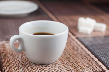 White coffee cup sugar cubes on table.Coffee time