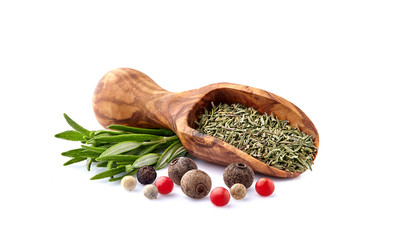 Rosmary with pepper assorted  in closeup on white background. Dry rosemary in wooden spoon....